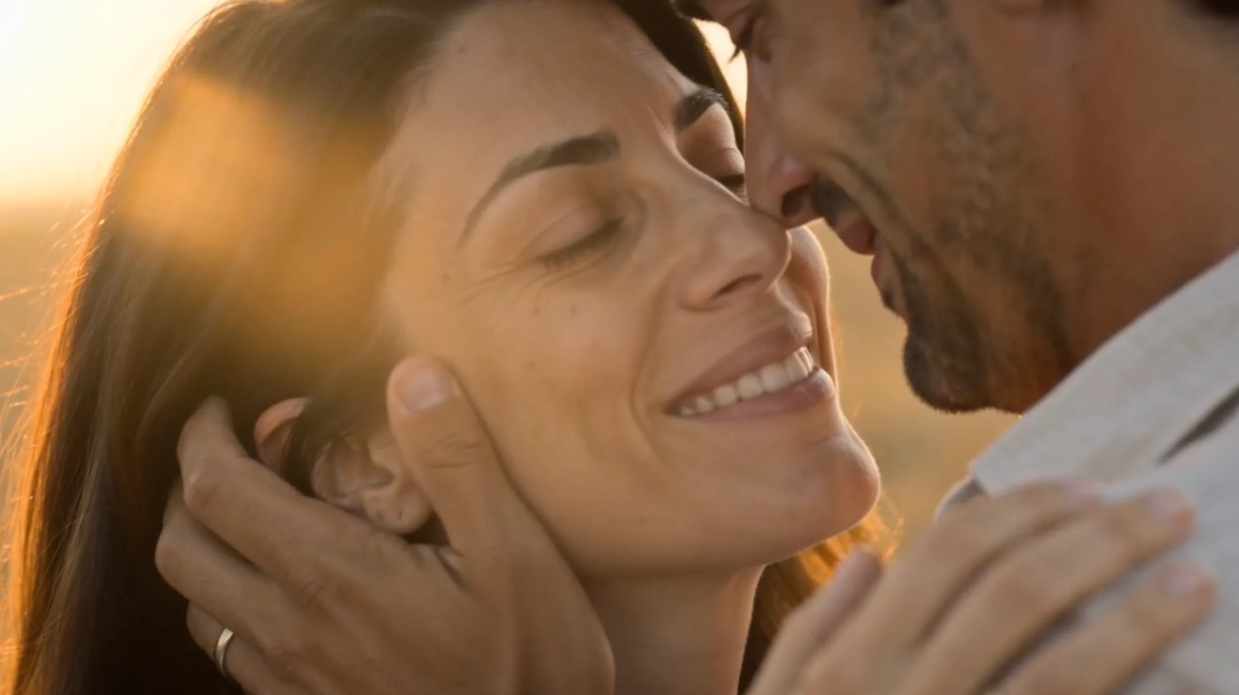 The two healthy characters sharing a warm moment in golden sunlight